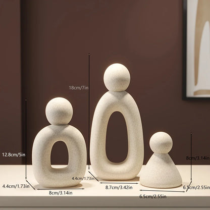 3 stuks Abstracte Familie van Drie Ornamenten – Resin Sculptuur. (2 varianten)